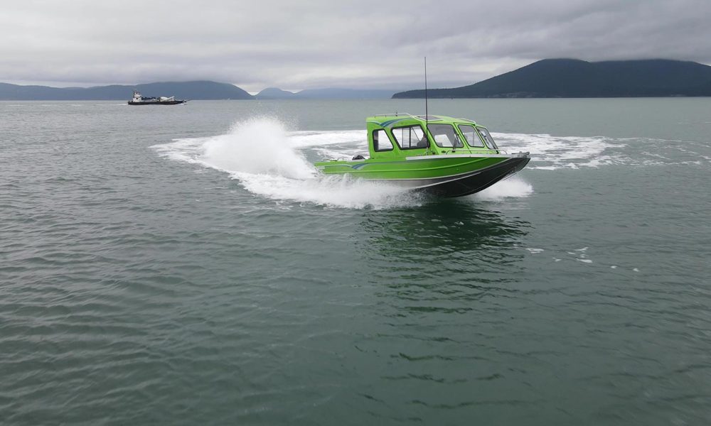 Our aluminum Taku jet boat turning through the water